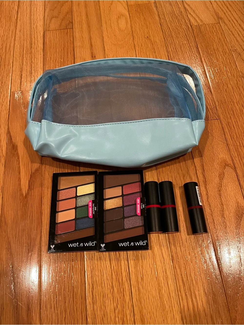 Make Up Bundle WetnWildEyeshadow Palettes & Lipsticks with Light Blue Makeup Bag